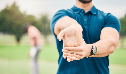 Image showing Golf, sports and man stretching hand on course for game, practice and training for competition. Professional golfer, fitness and hands of male athlete warm up for exercise, golfing and recreation