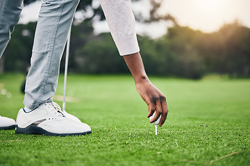 Image showing Hobby, golf ball and tee with hand of black man on field for training, tournament and challenge. Start, competition match and ready with athlete and club on course for action, games and sports