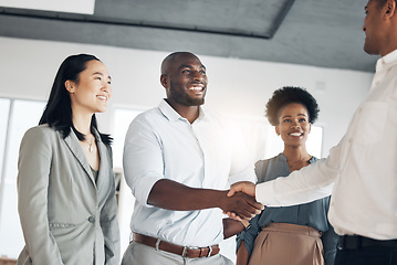 Image showing B2b, black man or manager shaking hands in meeting or startup project partnership or business deal. Teamwork, office handshake or happy worker talking or speaking of success or hiring agreement