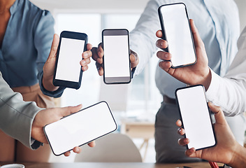 Image showing Business people, hands or phone screen on mockup in office networking, advertising or digital marketing. Team of employees with online product placement on display on mobile application or website ux