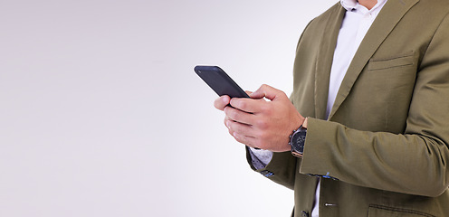 Image showing Businessman, hands and phone typing on mockup for social media or communication against a white studio background. Hand of isolated employee man texting, chatting or browsing on mobile smartphone app