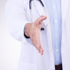 Image showing Doctor, man and handshake for healthcare partnership, meeting or greeting against a white studio background. Hand of isolated male medical professional shaking hands for introduction or thank you