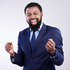 Image showing Yes, winner face and business black man isolated on gray background in celebration for opportunity, bonus or winning. Happy person, fist pump and celebrate corporate promotion or job news in studio