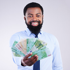 Image showing Finance, money and portrait of black man in studio for winner, investment and wealthy. Success, payment and profit with male holding cash isolated on white background for cashback, salary and rich