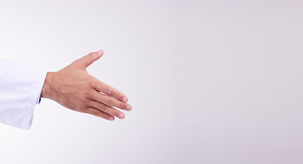 Image showing Doctor, handshake and mockup for healthcare partnership, meeting or greeting against a white studio background. Hand of isolated medical professional shaking hands for introduction, deal or thank you