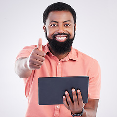 Image showing Thumbs up portrait, tablet or happy black man with emoji gesture for congratulations, job well done or winner. Agreement, finance results or studio person with yes sign for success on grey background