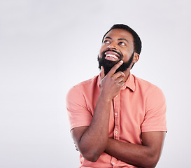 Image showing Thinking, mockup space and face of black man with hand gesture for brainstorming, ideas and thoughtful. Happy, smile and male on white background pose for choice, decision and wondering in studio