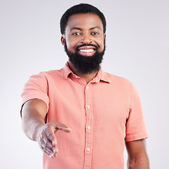 Image showing Portrait, success and black man with handshake, greeting and happiness against studio background. Face, African American male employee and entrepreneur with gesture for welcome, smile and trust