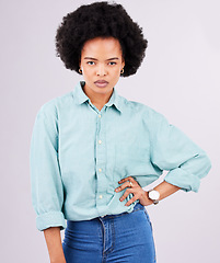 Image showing Portrait, serious and black woman in studio, assertive and empowered posing against white background. Face, confident and young female with attitude, fierce or focus mindset while standing isolated