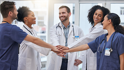 Image showing Healthcare, teamwork and doctors with nurses hands in support of planning, collaboration and innovation. Team, hand and huddle with expert people united for mission, trust and help while at a clinic