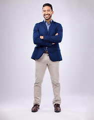 Image showing Crossed arms, smile and portrait of man in studio with positive mindset, happy and confidence. Corporate, business and isolated male standing as professional with pride on white background mockup