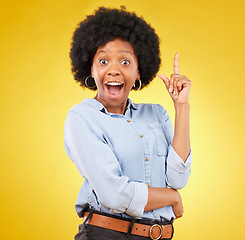 Image showing Portrait, eureka idea and black woman in studio isolated on a yellow background. Thinking, surprise wow and smile, happy or excited, beautiful and young African female with ideas or contemplating.