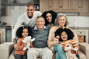 Image showing Big family, portrait smile and relax on sofa for bonding, generations or holiday in living room at home. Happy parents, grandparents and children smiling or relaxing on couch together for fun weekend