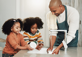 Image showing Cleaning, learning and happy with black family in kitchen for bonding, hygiene and teaching. Smile, support and natural with father and children rinse dishes at home for sanitary, washing and chores