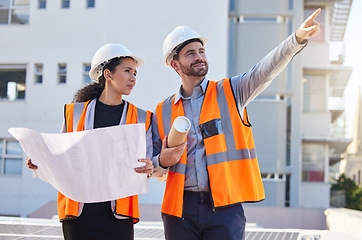 Image showing Architecture people pointing outdoor with blueprint planning, teamwork and construction worker at city site. Engineering project, floor plan and woman, contractor or partner for building development