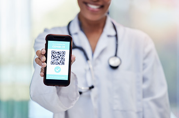 Image showing Doctor with QR code for healthcare or covid test results on contactless technology on mobile cellphone online. Hand, smartphone and woman medical or medicine professional with electric registration