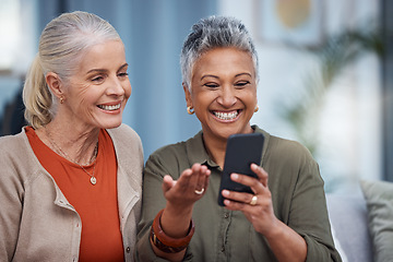 Image showing Elderly women smile, phone social media and living room with senior females on web mobile. Video streaming, happiness and conversation at a house with old people together on technology at home