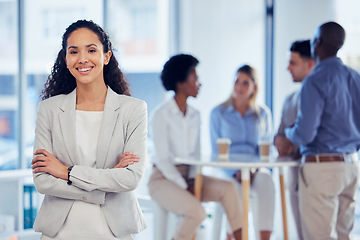 Image showing Portrait, business and woman arms crossed, success and employee with team, workplace and happiness. Face, female leader and manager with skills, smile and advertising campaign in office and confident