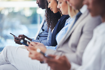 Image showing Business people, hiring and hands with phone in waiting room for networking, social media or communication at office. Group of employee workers wait in line or row with smartphone on recruitment app