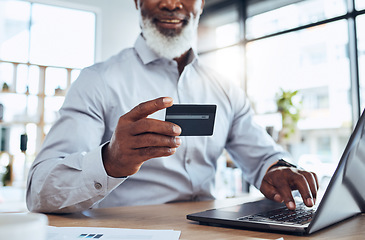 Image showing Hands of black man, business credit card and laptop for ecommerce, finance or accounting in office. Worker, computer and financial payment of budget, fintech trading or banking of investment economy