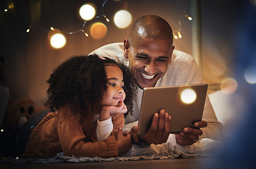 Image showing Night, tablet and relax with father and daughter in blanket tent for connection, happy and streaming cartoon. Smile, app and fairy lights with man and girl at home for education, internet and online