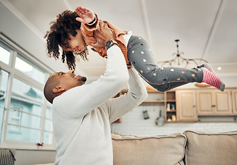 Image showing Love, father and girl in air, quality time and happiness in living room, carefree and bonding together. Family, parent and dad with female child, daughter or kid playing, airplane or loving in lounge