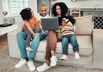 Image showing Happy family, laptop and kids on sofa for video, comedy movie and streaming on internet for quality time. Man, woman and children with computer for film, movies or games on lounge couch for holiday