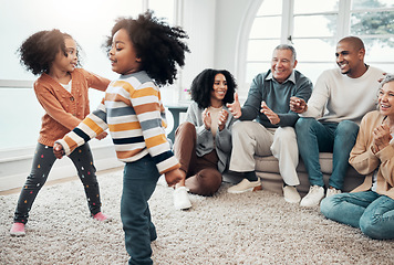 Image showing Happy family, children dancing and living room with parents, grandparents or love with applause in home. Girl kids, mom and dad with dance, smile or happiness for bonding in house together on holiday