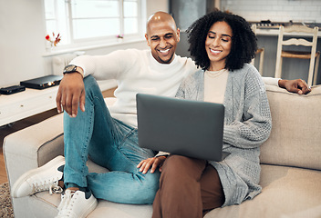 Image showing Relax, happy and couple on a sofa with laptop in the living room of their modern house. Love, romantic and young man and woman browsing or scrolling on social media or internet with computer together