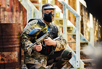 Image showing Paintball, portrait or male soldier with gun in shooting game playing on fun training battlefield mission. Man or focused warrior with army weapons gear for survival in military challenge competition