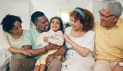 Image showing Black family, laugh and living room couch with bonding, parent love and care in home. Lounge, happiness and children with mom and dad together feeling happy with a hug on a sofa with mama and dad