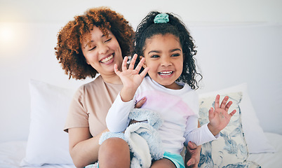 Image showing Love, mother and girl in bedroom, playing and quality time together with happiness, bonding and loving. Family, mama or daughter on bed, smile or relax on weekend, break and fun with joy and cheerful