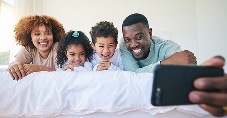 Image showing Love, bedroom and selfie of happy black family bonding, relax or enjoy quality time together on Jamaica holiday. Youth children, parents and morning memory photo of kids, mother and father on bed