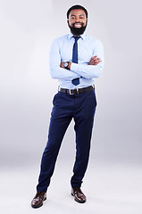 Image showing Portrait, success and black man with arms crossed, employee and happiness against a studio background. Face, African American male entrepreneur and consultant with skills, management and leadership