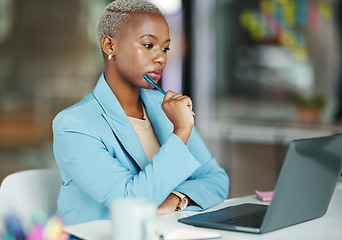 Image showing Laptop, thinking and a business black woman at work in her office on a review, proposal or project. Serious, focus and idea with a female employee reading an email or doing research while working