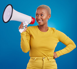 Image showing Black woman, megaphone and smile, protest and voice, freedom of speech and activism on blue background. Happy female, broadcast and speak out, rally and activist, loudspeaker with opinion in studio