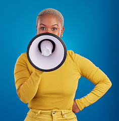 Image showing Megaphone, protest and speaker with black woman in studio for change, democracy and opinion. Vote, announcement and message with female isolated on blue background for empowerment, strike and choice