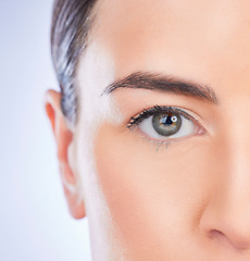 Image showing Closeup, portrait and woman with skincare, cosmetics and dermatology against a studio background. Face, female and lady with grooming, zoom and treatment with natural care, eye and morning routine