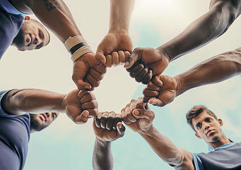 Image showing Hands, fist and solidarity with a sports team standing in a huddle for unity or motivation before a game. Fitness, teamwork and diversity with a group of men in a circle, getting ready for a match
