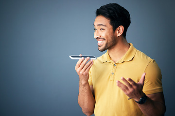 Image showing Mockup, phone call and Asian man with speaker, conversation and connection against a studio background. Japan, male and guy with smartphone, talking and discussion with network signal and happiness