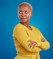 Image showing Proud profile of a black woman isolated on a blue background with confidence and creative mindset. Young african female or model with empowerment, fashion and beauty ideas in studio