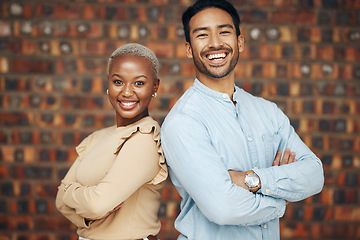 Image showing Young, professional team and partnership, portrait with teamwork and friends against wall background. Happy working together, creative pair and diversity, black woman and man, collaboration and trust