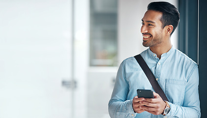 Image showing Happy, business and an Asian man with a phone for social media, communication and chat. Thinking, mockup and a Chinese employee typing on a mobile app, replying to a message or work email online