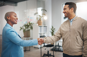 Image showing Business people, handshake and partnership in collaboration for trust, unity or teamwork at the office. Businessman and woman shaking hands in meeting, b2b or agreement for greeting, welcome or deal