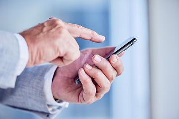 Image showing Hands, phone and scrolling with a business man in his office, closeup for communication or networking. Mobile, contact and internet with a male employee typing a text message or making a call