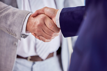 Image showing Closeup, business and handshake with employees, staff and collaboration in workplace, success and agreement. Zoom, hands or coworkers with partnership, greeting and welcome with support or solidarity