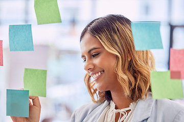 Image showing Planning, brainstorming and woman writing on glass board for project management, workflow and job schedule. Creative worker or indian person with sticky note ideas for career strategy or goals