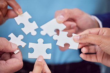 Image showing Hands, puzzle and team closeup of collaboration, creative and partnership, unity and cooperation. Zoom, hand and jigsaw formula by business people with synergy, teamwork and integration or strategy