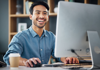 Image showing Computer, research and business man in office working online for information technology, internet or global digital company. Asian person or worker planning, reading or editing report on desktop pc