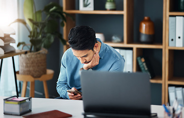 Image showing Bored, phone and businessman in his office networking on social media, mobile app or the internet. Technology, professional and tired male employee browsing on a website with a cellphone in workplace